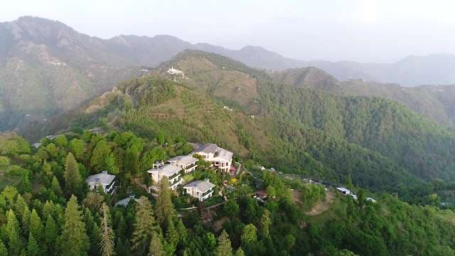 Stunning Panoramic View of Lush Green Himalayan Hills and Resorts