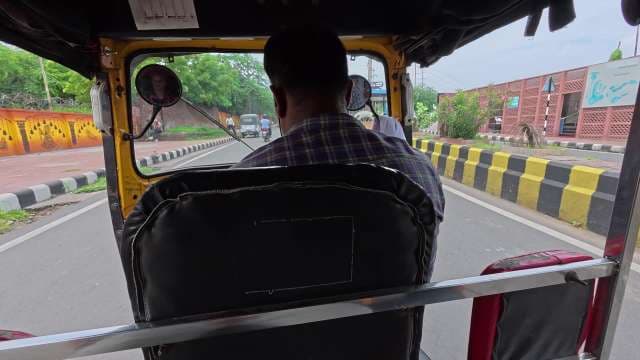 POV Interior View of Auto Rickshaw Driving on Indian City Street