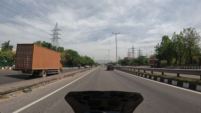 POV Highway Driving in India with Trucks and Power Lines