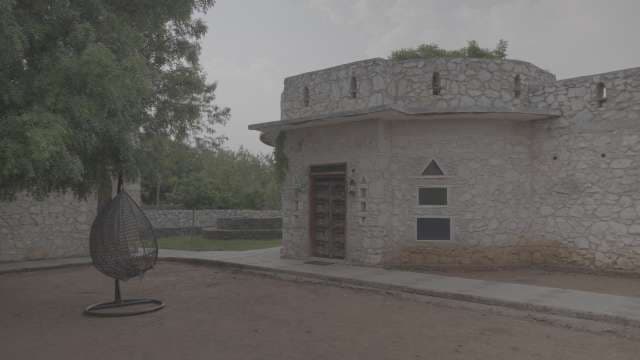 Traditional Stone Cottage Architecture and Courtyard at Luxury Travel Resort