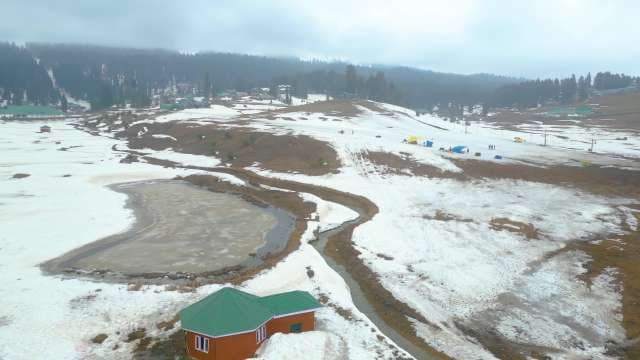 Aerial View of Gulmarg Snowy Landscape and Frozen Lake in Kashmir