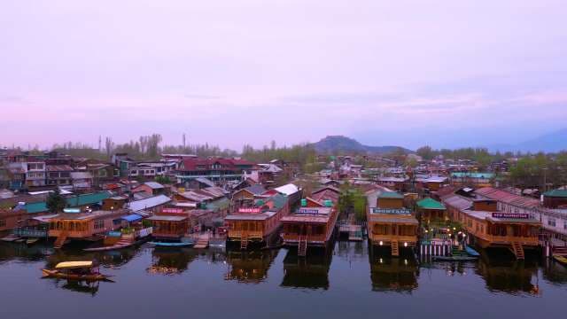 Traditional Houseboats on Dal Lake at Twilight in Srinagar