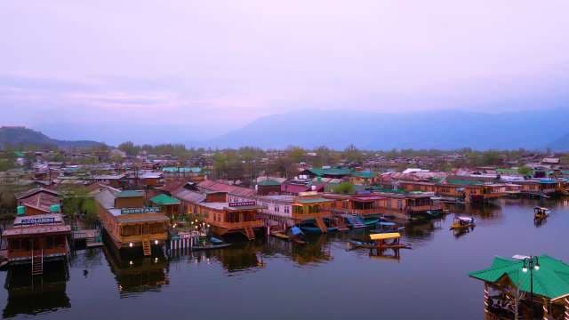 Scenic Houseboats on Dal Lake at Dusk in Srinagar Kashmir