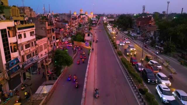 Aerial View of Busy Ludhiana Traffic Near Golden Temple at Dusk