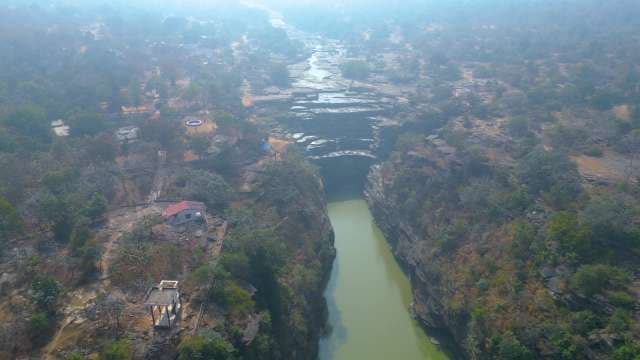 Aerial View of Majestic Rocky Canyon and Misty Tiered Rajdari and Devdari Waterfall