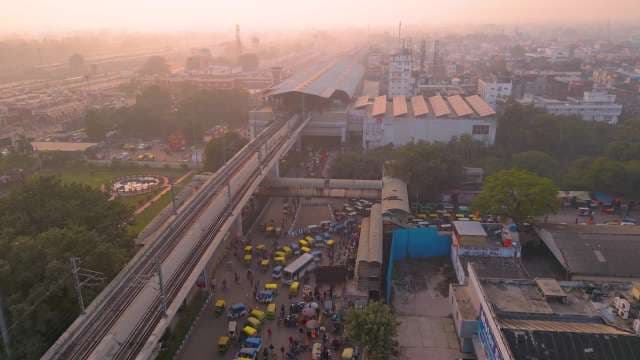 Aerial View of Hazy Metro Station and Traffic in Lucknow