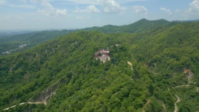 Aerial View of Hilltop Temple in Lush Green Mountains Haridwar India