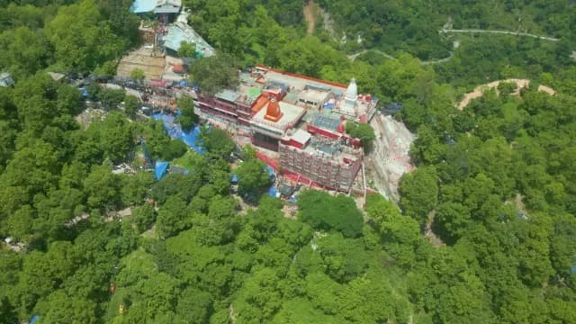 Aerial View of Mansa Devi Temple on Lush Green Hillside