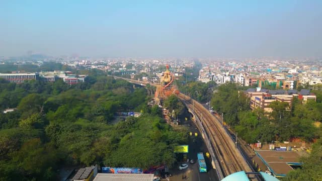Aerial View of New Delhi Hanuman Statue and Metro Line