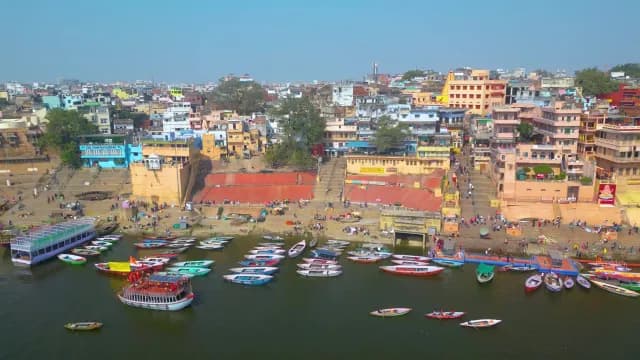 Aerial View of Varanasi Ghats and Colorful Boats on Ganges