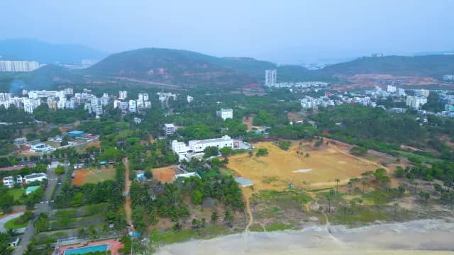 Aerial View of Coastal City and Mountains in Visakhapatnam