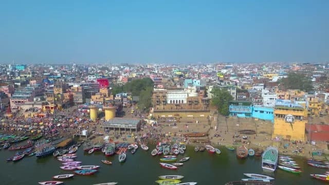Aerial View of Varanasi Ghats and Ganges River with Boats