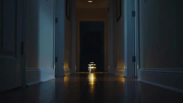 Atmospheric Dark Hallway with Glowing Lantern at Night