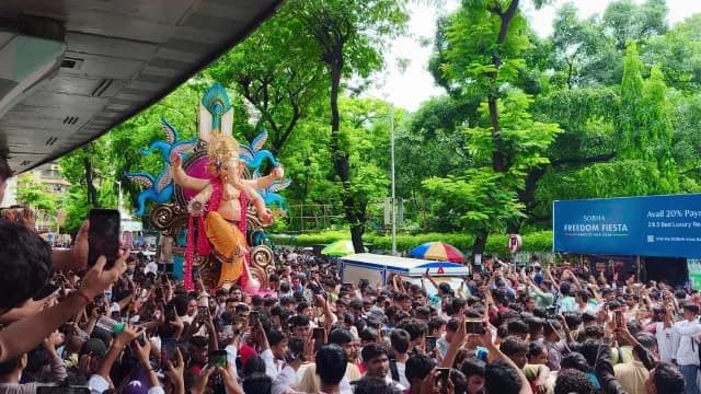 Ganesh Chaturthi Festival Procession with Large Crowd in Mumbai