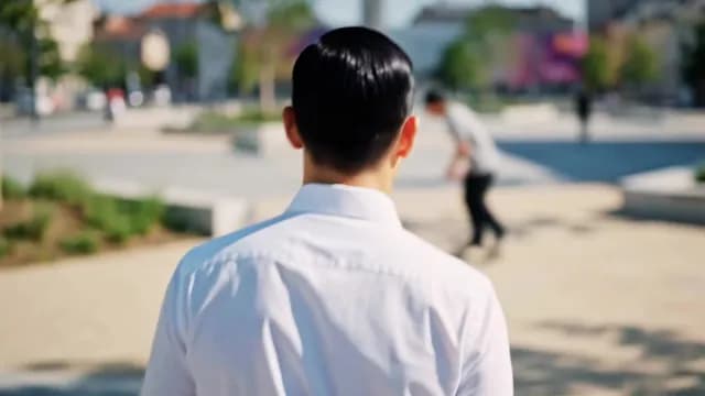 Professional Man Walking in Sunny Urban City Plaza