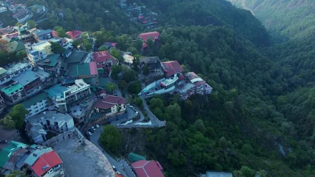 Aerial View of Scenic Mussoorie Hill Station Buildings and Green Mountains