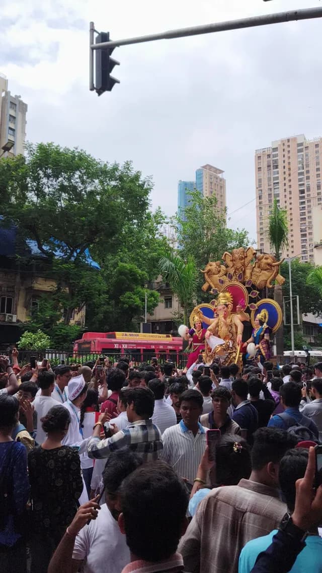 Ganesh Chaturthi Festival Procession with Large Crowds in Mumbai India