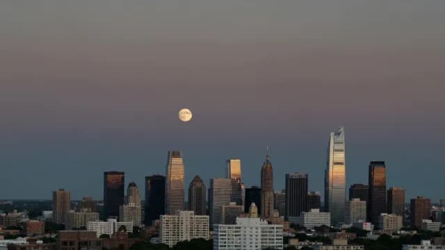 Full Moon Over Skyline at Twilight