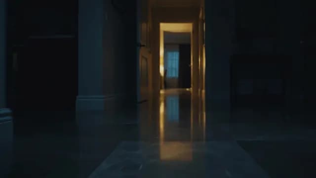 Dimly Lit Dark Hallway Inside a Residential Home at Night