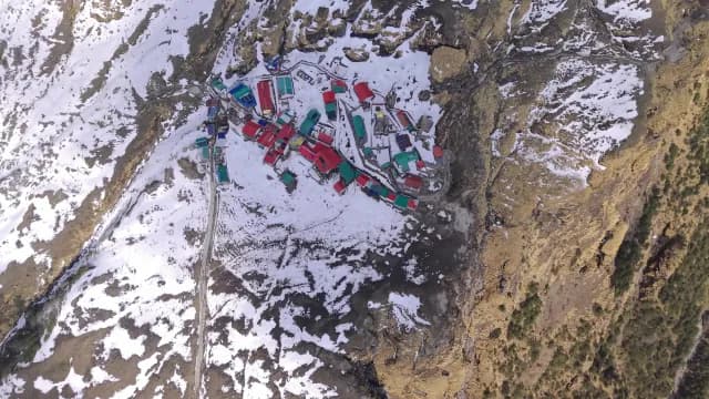 Aerial Top-Down View of a Snowy Himalayan Mountain Village Chopta, Uttarakhand