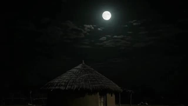 Full Moon Glowing Over a Traditional Thatched Roof Hut at Night