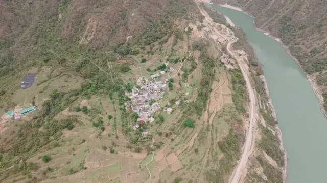 Aerial View of a Remote Alaknanda River, Rudraprayag Road, Uttarakhand Village by a Winding River