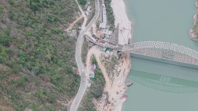 Aerial View of Massive Steel Arch Bridge Construction Over a Alaknanda River, Rudraprayag Road, Uttarakhand