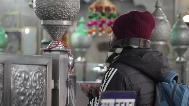 Muslim Man Offering Prayer at a Traditional Bu Ali Shah Qalandar Dargah_Panipat, Haryana
