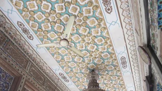 Intricate Ornate Ceiling with Gold and Turquoise Patterns in Historic Building of Bu Ali Shah Qalandar Dargah Panipat, Haryana, India