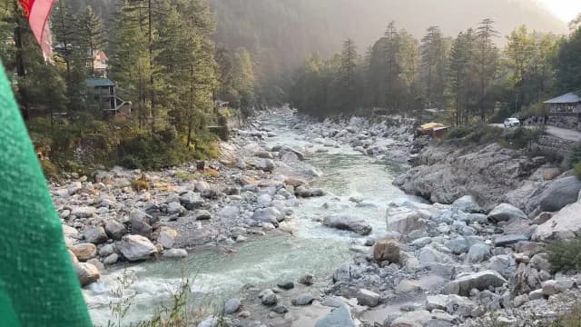 Scenic Rocky Parvati Valley Trek Flowing Through Lush Himalayan Valley