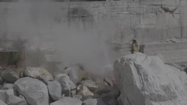 Natural Geothermal Steam Rising from Rocks at Manikaran Hot Springs