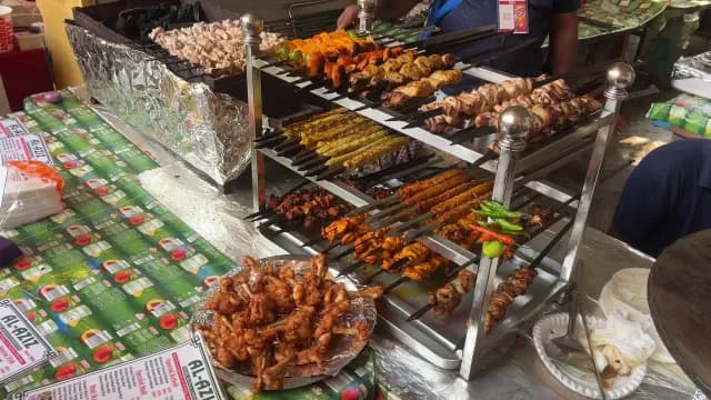 Assorted Indian Street Food Kebabs and Grilled Meats on Skewers