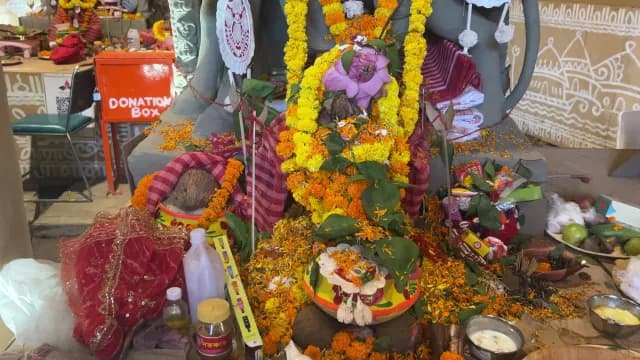 Traditional Hindu Puja Altar Decorated with Marigold Flowers and Offerings in Delhi