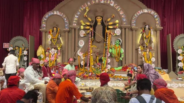 Traditional Durga Puja Festival Celebration with Idols and Devotees in Delhi