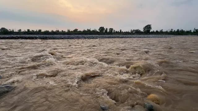 Fast Flowing Muddy River at Sunset, Kosi River, Bihar