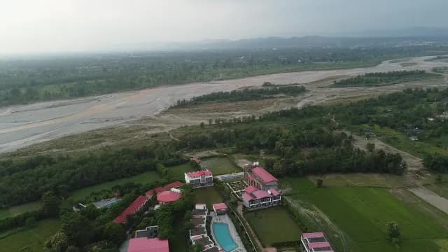 Aerial View of Luxury Resort Near Dry Riverbed and Mountains of Ramnagar, Uttarakhand