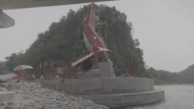 Winding Red Walkway to a Mountain Shrine in Girija Devi Mandir, Ramnagar, Uttarakhand