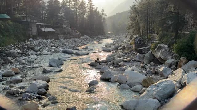 Scenic Mountain River Flowing Through Rocky Valley at Sunset, Kasol, Himachal Pradesh