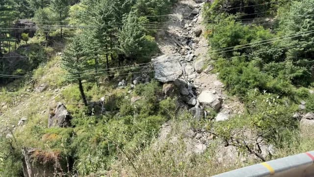 Small Waterfall Cascading Down Rocky Mountain Slope with Lush Greenery, Kasol, Himachal Pradesh