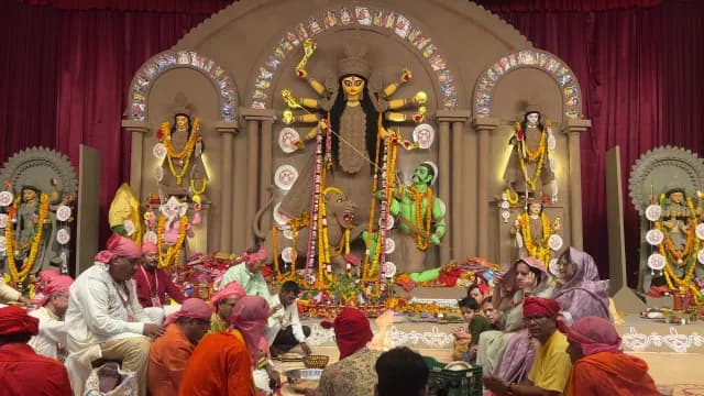 Durga Puja Festival Celebration with Devotees and Traditional Idols